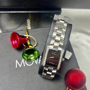 Movado lady's Eliro black dial diamond set case stainless watch